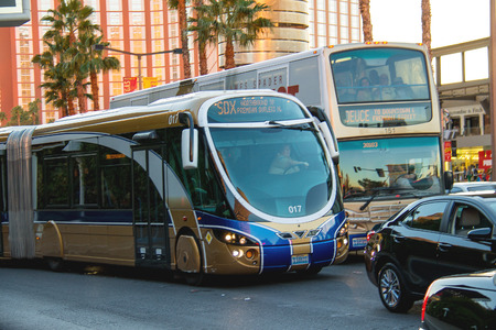 LAS VEGAS, NEVADA, USA - OCTOBER 25, 2013 : A regular and tourist buses in Las Vegas, Nevada. 40 million tourists visited Las Vegas in 2012 のeditorial素材