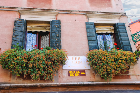 VENICE, ITALY - MAY 06, 2014: Facade of the house on the street in Venice, Italyのeditorial素材