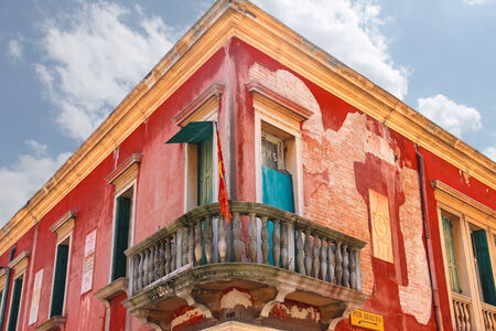 VENICE, ITALY - MAY 06, 2014: Flag on the balcony of the old mansion in Venice, Italyのeditorial素材