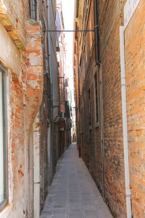 VENICE, ITALY - MAY 06, 2014: Narrow street in Venice, Italyのeditorial素材