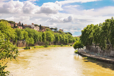 ROME, ITALY - MAY 03, 2014: People on the picturesque waterfront of the Tiber River in Rome, Italyのeditorial素材