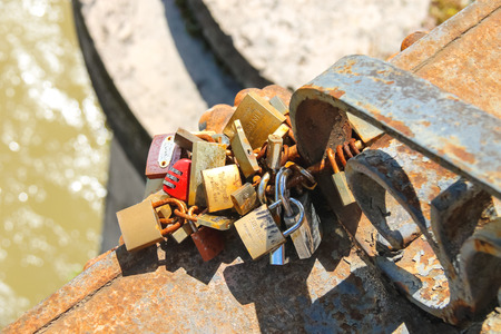 ROME, ITALY - MAY 03, 2014: Love locks on the bridge across the Tiber in Rome, Italy