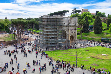 ROME, ITALY - MAY 04, 2014: Tourists in square near the Triumphal Arch of Constantine in Rome, Italy...