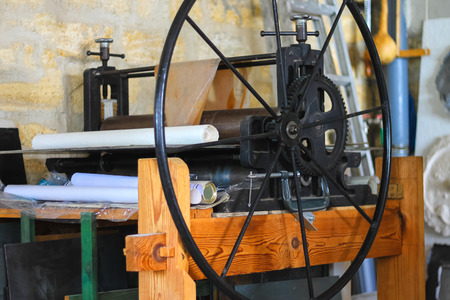 Machine for printing on fabric is in a workshopのeditorial素材