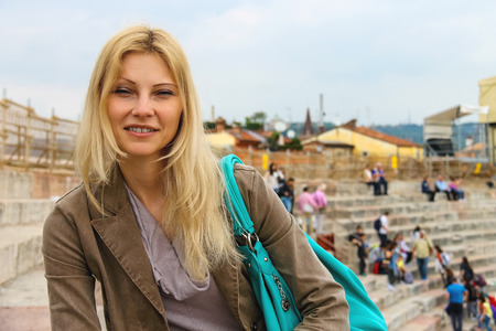 Attractive girl inside the Arena of Verona - the place of annual festival operas in Verona, Italyの写真素材