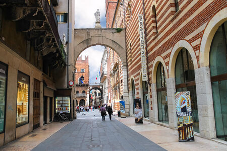 VERONA, ITALY - MAY 7, 2014: People on the street outside  Palazzo della Ragione in Verona, Italyのeditorial素材