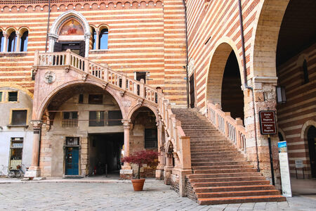 VERONA, ITALY - MAY 7, 2014: Staircase of reason in courtyard  the Palazzo della Ragione in Verona, Italyのeditorial素材