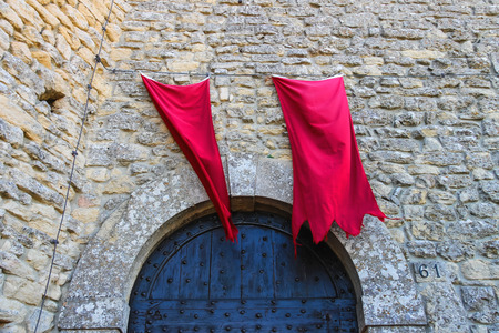 Red flags over the gates fortresses in San Marino. The Republic of San Marino