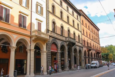 Bologna, Italy - August 18, 2014: People and cars on the street Indipendenza in Bologna, Italy