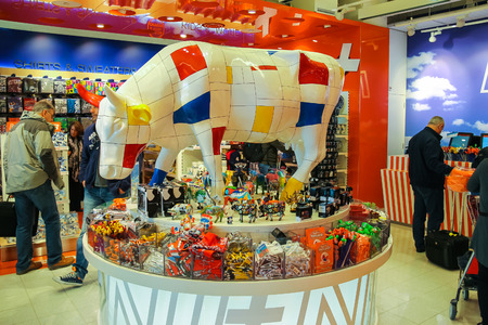 Amsterdam Schiphol, Netherlands - April 18, 2015: Passengers are shopping in the gift shop at the airport Amsterdam Schiphol, Netherlandsのeditorial素材