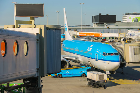 Amsterdam Schiphol, Netherlands - April 18, 2015: Maintenance of aircraft on the airfield at the airport Amsterdam Schiphol, Netherlandsのeditorial素材