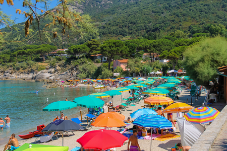 St Andreas, Italy - July 01, 2015: People on the coast of Tyrrhenian Sea, Sant Andreas on Elba Island, Italyのeditorial素材