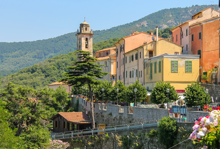 Marciana, Italy - July 01, 2015: Old houses and bell tower on the hill on Elba Island, Italyのeditorial素材