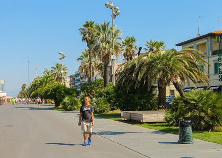 Viareggio, Italy - June 28, 2015: Tourists walking on the street. Viareggio is the famous resort on the coast of the Ligurian Sea. Province Lucca, Tuscany region of Italyのeditorial素材