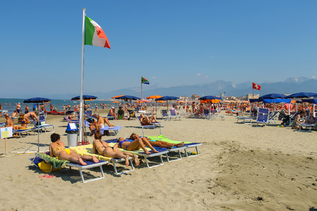 Viareggio, Italy - June 28, 2015: People resting on the beach. Viareggio is the famous resort on the coast of the Ligurian Seaのeditorial素材