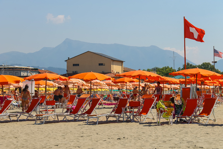 Viareggio, Italy - June 28, 2015: People resting on the beach. Viareggio is the famous resort on the coast of the Ligurian Seaのeditorial素材