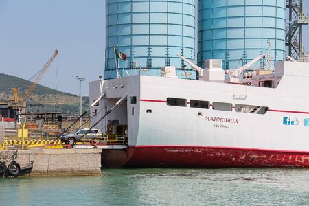 Piombino, Italy - June 30, 2015: Ferry boat Marmorica unload a vehicle. Ferry with capacity 470 passengers and 106 vehiclesのeditorial素材