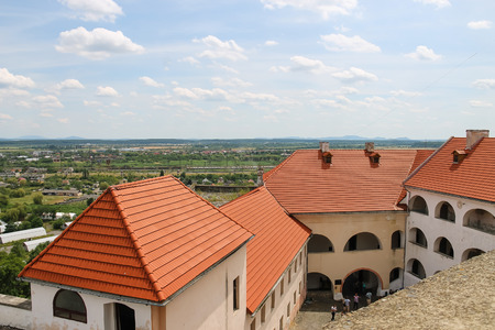 Mukachevo, Ukraine - July 2, 2014: Interior courtyard of Palanok Castle, seen with modern roofsのeditorial素材