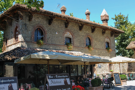 Grazzano Visconti, Italy - August 07, 2016: People in small tourist Aloisa restaurant in medieval castleのeditorial素材