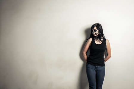 beautiful girl posing in halloween style.Isolated studio portrait