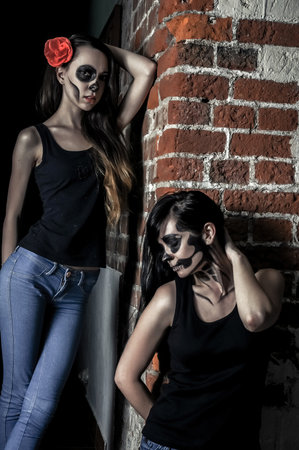 boy and girll posing in halloween style.Isolated studio portraitの写真素材