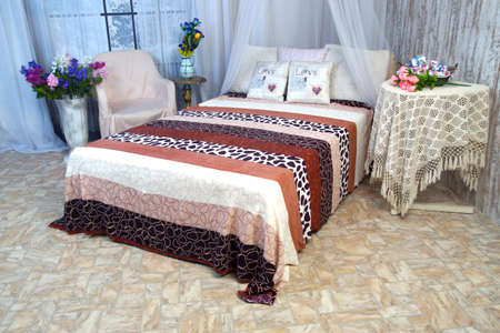 Beautiful interior of the room with a bed.Isolated