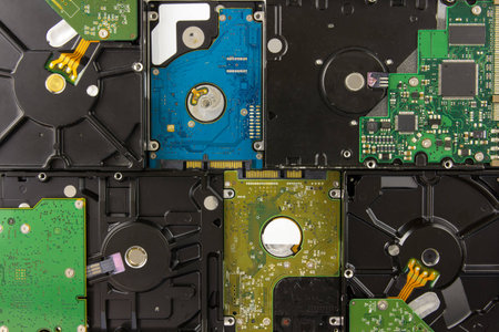 multiple hard disk drives lying close up