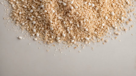Heap of sesame seeds on white background, top view.の素材