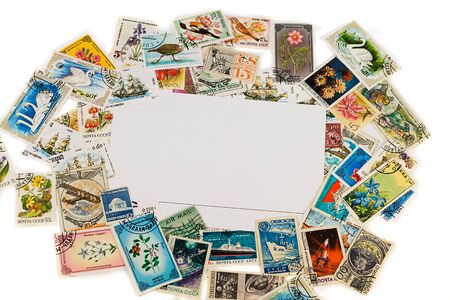 blank postcard with vintage stamps and space for textの写真素材