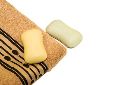 bathroom set. towel and soap isolated on whiteの写真素材