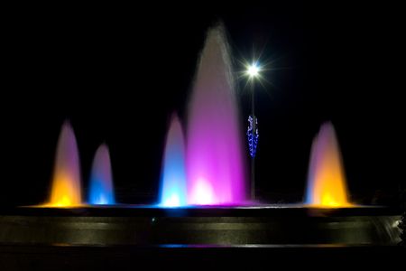 beautiful illuminated fountain at nightの写真素材