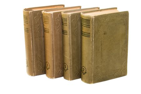 old ancient books isolated on whiteの写真素材