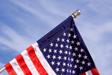 American flag against blue sky