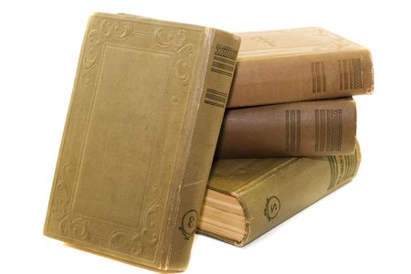 Old hardcover books isolated on whiteの写真素材