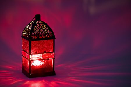 Burning lantern in the darkの写真素材