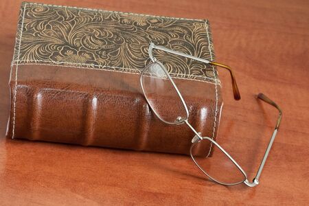 vintage book with glasses