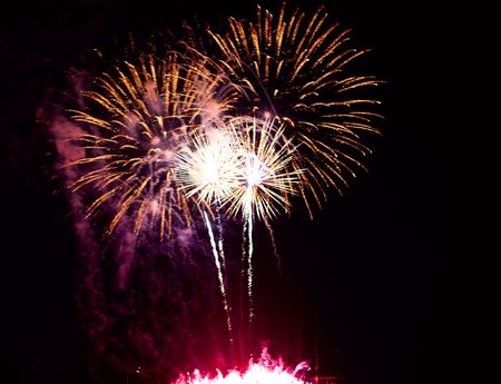Colorful fireworks on the black sky backgroundの写真素材