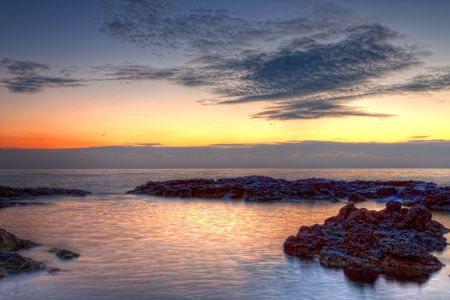 Sea and rock at the sunset. Crimea, Ukraine