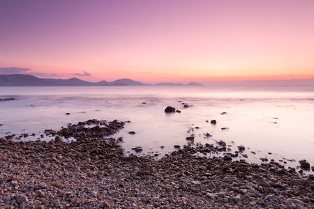 colorful sunrise on the rocky coast, Florida, USAの写真素材