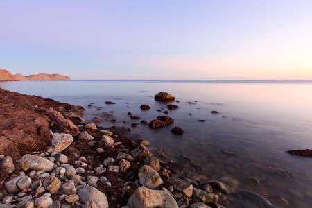 sunset on rocky sea coast, Crimea, Ukraineの写真素材