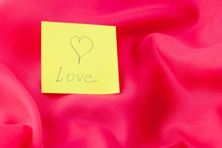 Yellow paper note with word 