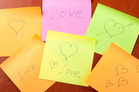  abstract background of paper notes with love and heartsの写真素材