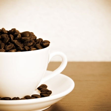 Coffee beans cup. Vintage styleの写真素材