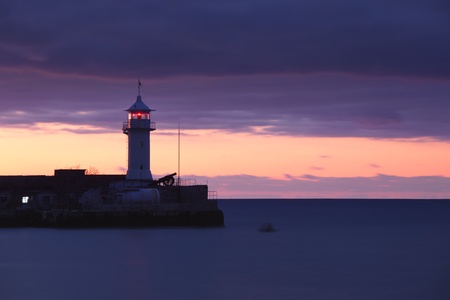 Lighthouse before sunriseの写真素材