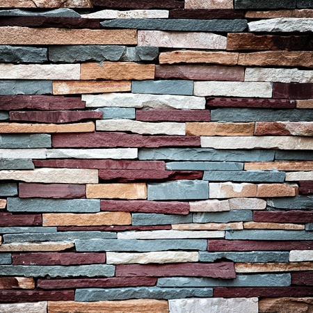 Abstract background of colorful stone wall texture の写真素材