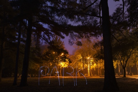 Early morning park. Word park written by light