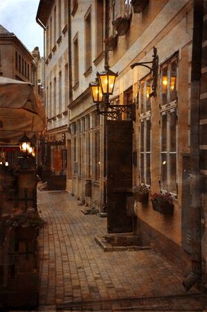 Vintage style photo of old European town streetの写真素材