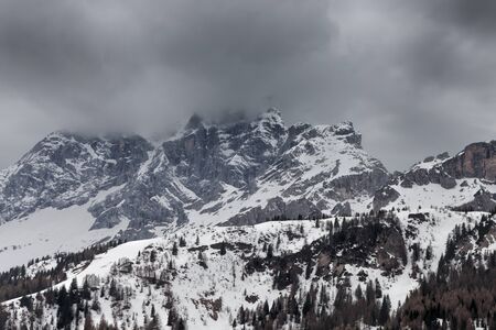 Cloudy spring weather in Dolomites mountains  Italian Dolomitesの写真素材