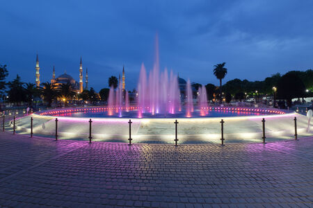Fountain and the Sultanahmet Blue Mosque at night, Istanbul, Turkeyのeditorial素材