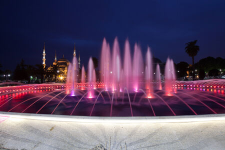 Fountain and the Sultanahmet Blue Mosque at night, Istanbul, Turkeyのeditorial素材